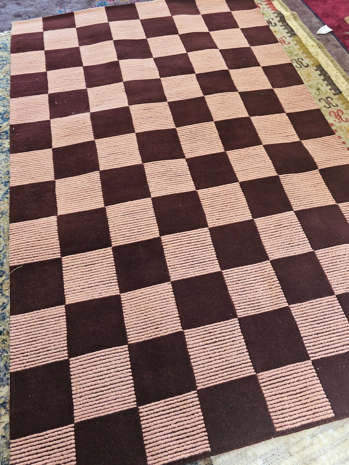 Burgundy checkerboard rug