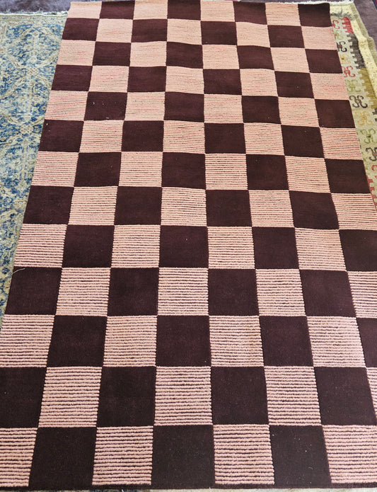 Burgundy checkerboard rug